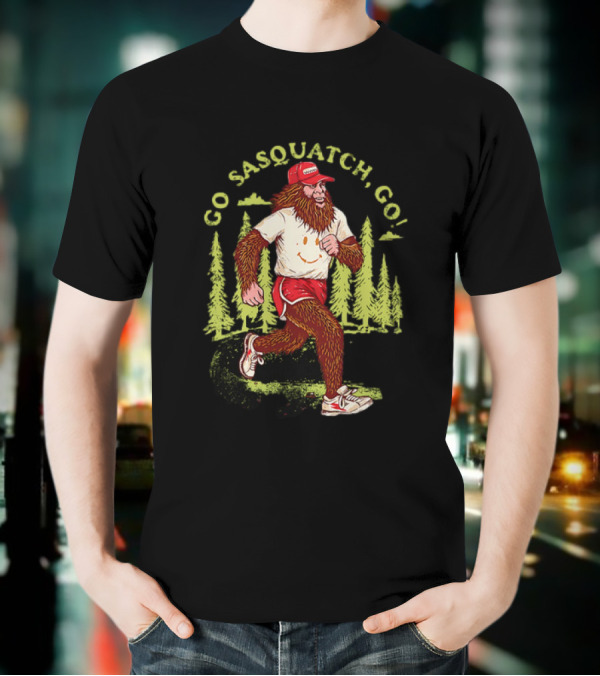 Go Sasquatch Go Bigfoot Jogging In Forest With Red Cap And Sneakers T-Shirt