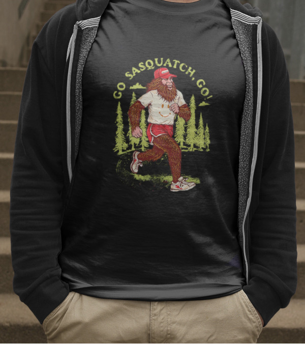 Go Sasquatch Go Bigfoot Jogging In Forest With Red Cap And Sneakers T-Shirt