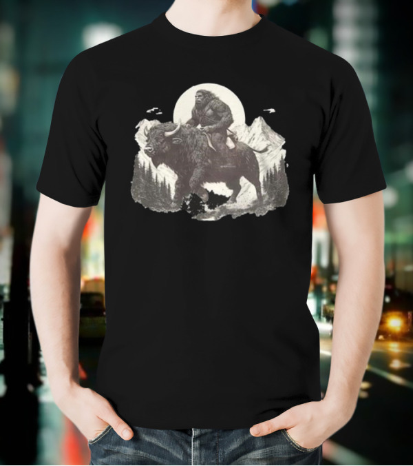 Blurry Creatures Bigfoot Riding Buffalo With Mountains And Moon In Background T-Shirt